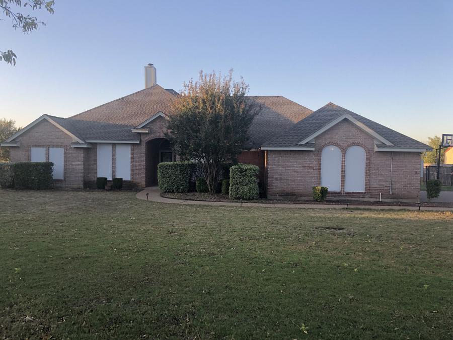 White solar screens installed on a home by Weatherford Glass