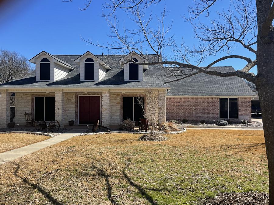 Solar screens installed on a home by Weatherford Glass